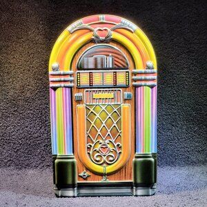 VINTAGE JUKEBOX COMPACT DISC STORAGE CONTAINER...METAL WARE... DOOR IS EMBOSSED